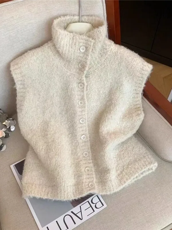 Женский вязаный жилет Koja с высоким воротником, весна 2026, меховая верхняя одежда на пуговицах, обычная посадка, корейский Sle Commute Faion
Женский вязаный жилет Koja с высоким воротником, весна 2026, меховая верхняя одежда на пуговицах, обычная посадка, корейский Sle Commute Faion