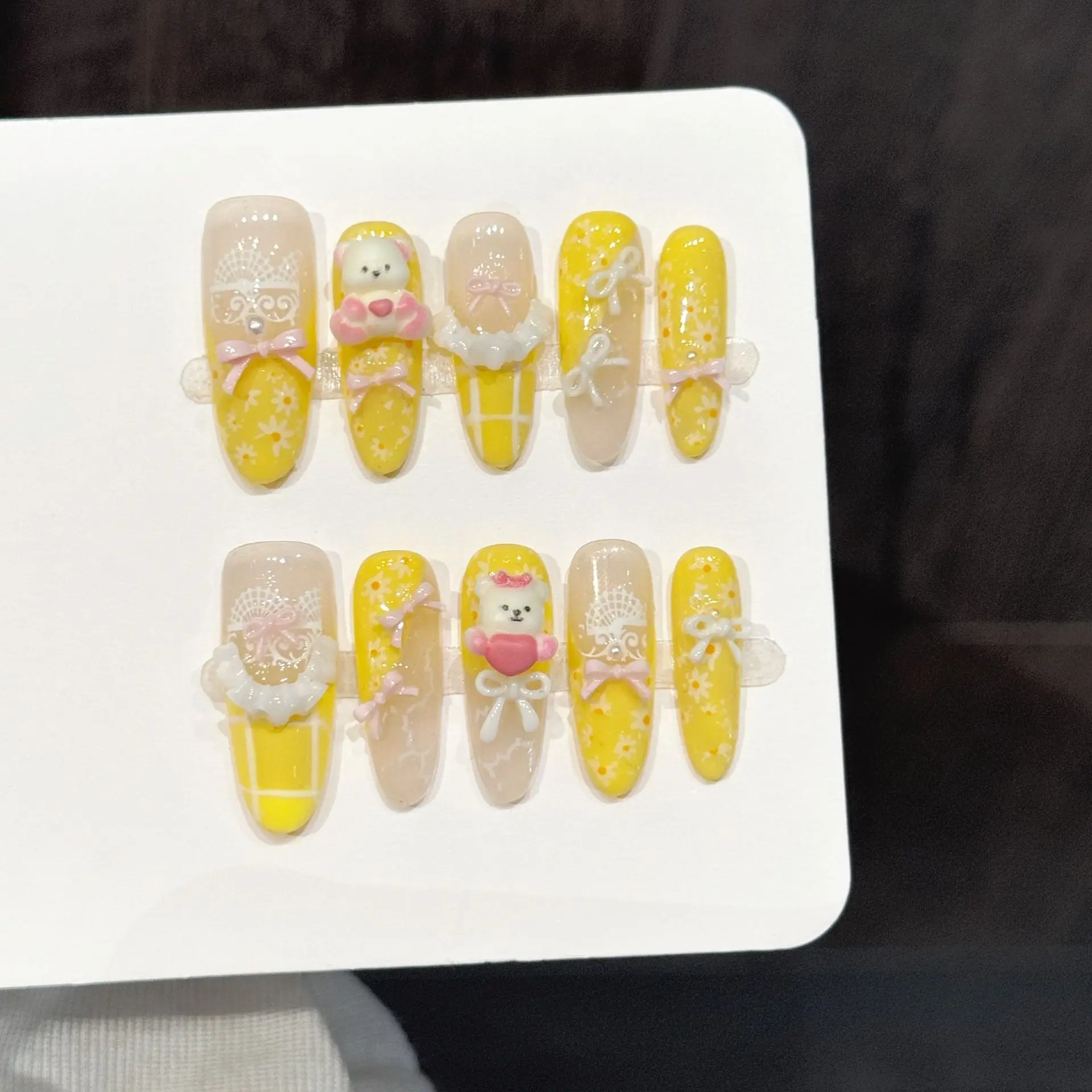 10pcs Hand-Pressed Long Oval Nail Art, Pretty Fake Nails, Creamy Yellow Bear Lace Bow, Sweet And Cute,Suitable For Women
10pcs Hand-Pressed Long Oval Nail Art, Pretty Fake Nails, Creamy Yellow Bear Lace Bow, Sweet And Cute,Suitable For Women