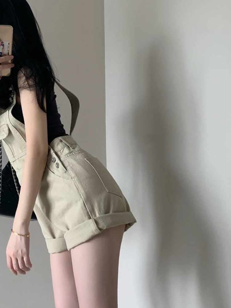 Женские джинсовые комбинезоны оверсайз в винтажном стиле с элементами гонконгского дизайна, летние, с высокой талией, для повседневной носки
Женские джинсовые комбинезоны оверсайз в винтажном стиле с элементами гонконгского дизайна, летние, с высокой талией, для повседневной носки