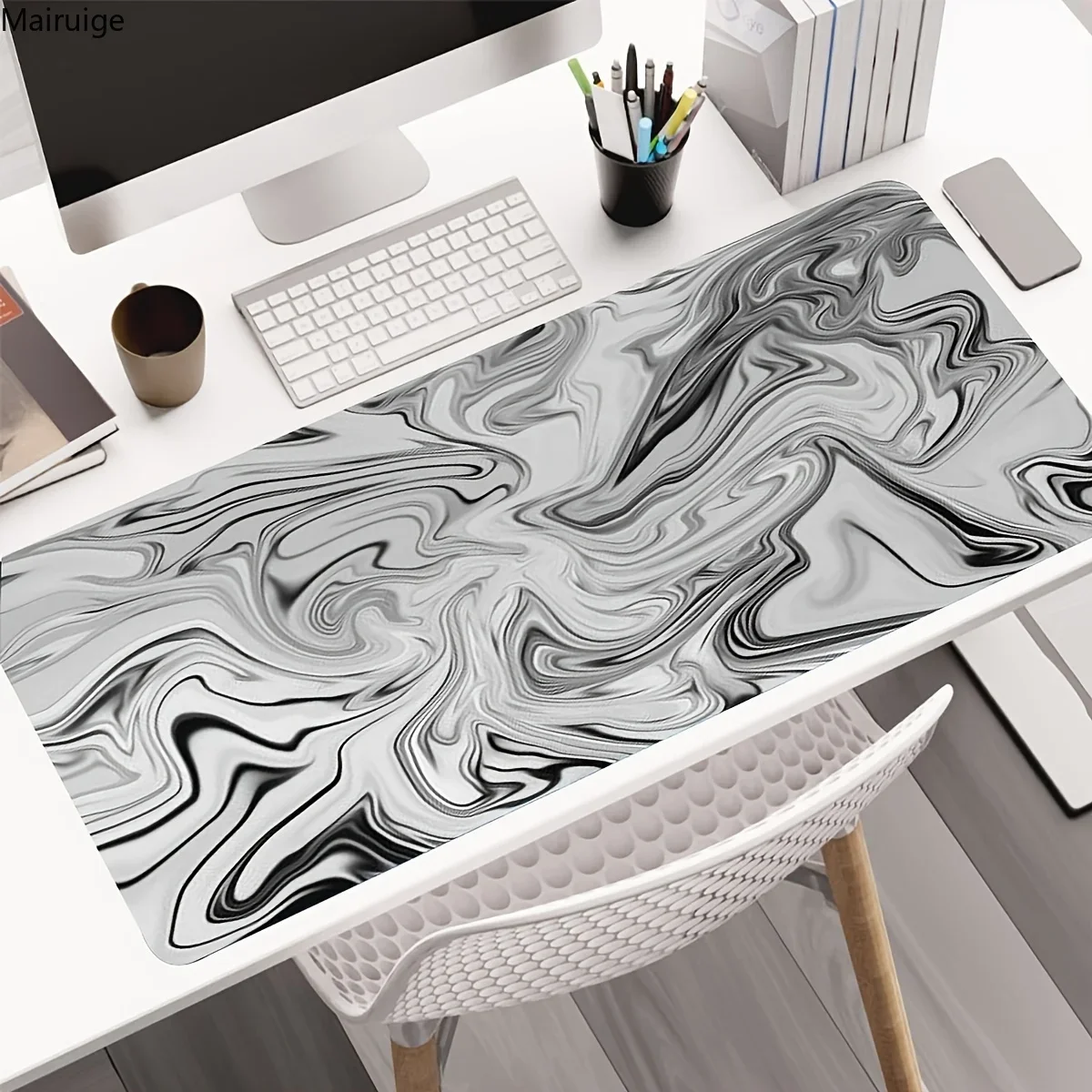 A large marble patterned mouse pad, game accessories, anti slip base, desk mat black and white design, durable 
A large marble patterned mouse pad, game accessories, anti slip base, desk mat black and white design, durable