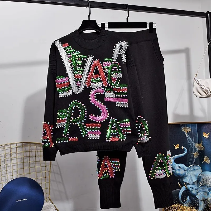 Letter Sequins Beading Knitted Tracksuits Set Women Casual 2pc Black White Pullover Sweater Long Pants Two Piece Outfits Female
Letter Sequins Beading Knitted Tracksuits Set Women Casual 2pc Black White Pullover Sweater Long Pants Two Piece Outfits Female