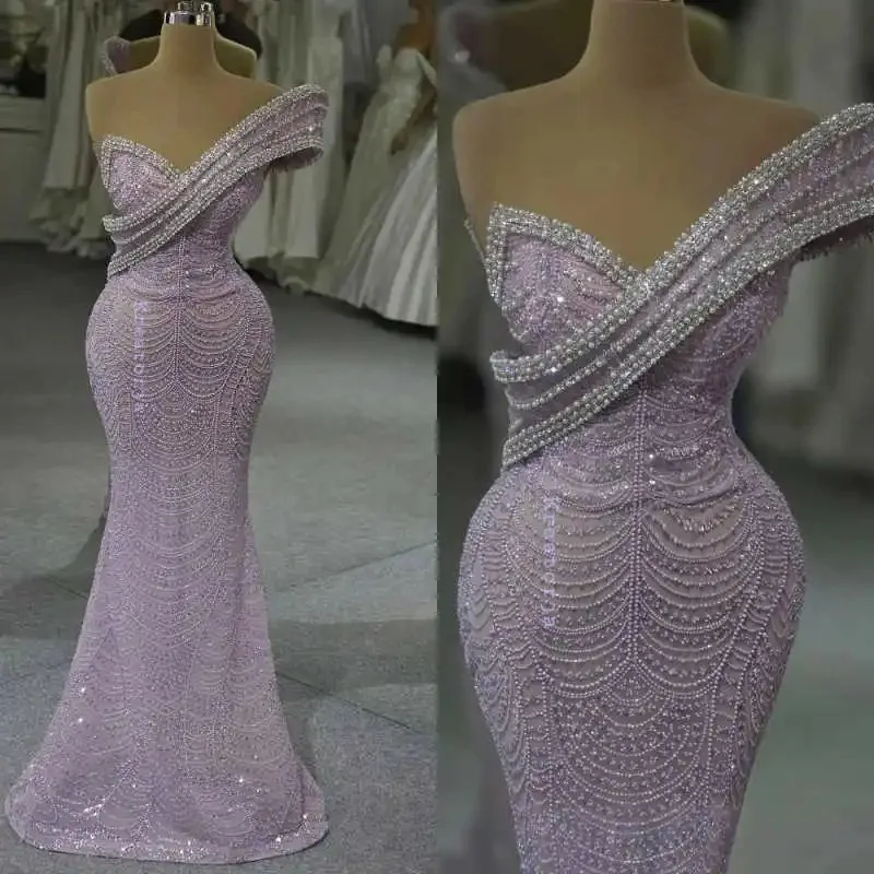 Индивидуальные 2026 новые сверкающие жемчужины Русалка Пром платья на одно плечо Вечерние платья без рукавов Кристаллы Вечерние знаменитостей
Индивидуальные 2026 новые сверкающие жемчужины Русалка Пром платья на одно плечо Вечерние платья без рукавов Кристаллы Вечерние знаменитостей