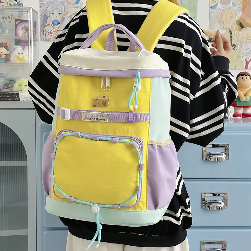 Nylon color-blocked ladies' backpack, lightweight drawstring, cute student schoolbag, multi-functional travel bag
Nylon color-blocked ladies' backpack, lightweight drawstring, cute student schoolbag, multi-functional travel bag