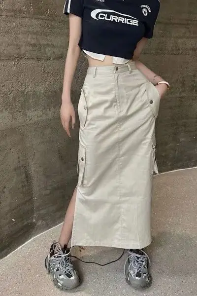 Y2K American Hot Girl Outfit Укороченная футболка из двух предметов и юбка-карго с высоким разрезом Комплект уличной одежды Летний комплект из двух предметов Мода
Y2K American Hot Girl Outfit Укороченная футболка из двух предметов и юбка-карго с высоким разрезом Комплект уличной одежды Летний комплект из двух предметов Мода