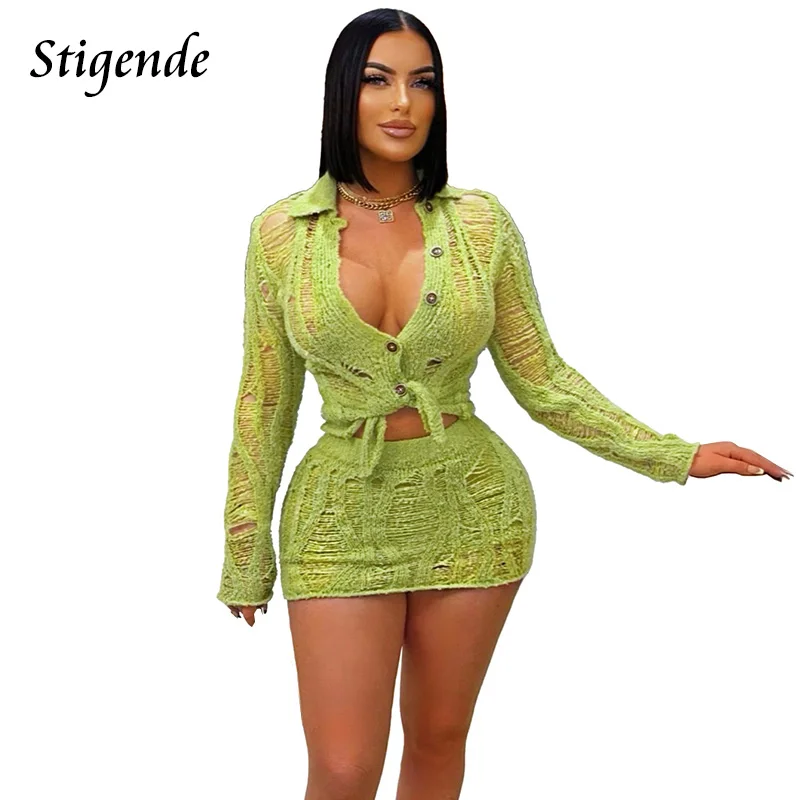 Stigende Women Sexy Hollow Out Knit Two Piece Outfit Long Sleeve Button Blouse and Mini Skirt Set
Stigende Women Sexy Hollow Out Knit Two Piece Outfit Long Sleeve Button Blouse and Mini Skirt Set