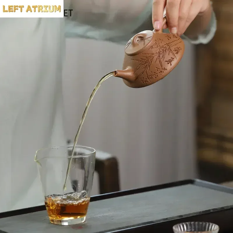 Yixing Purple Clay Stone Scoop Teapot Handmade Bamboo Leaf Pattern Tea Pot Beauty Tea Infuser Kettle Chinese Zisha Tea Set
Yixing Purple Clay Stone Scoop Teapot Handmade Bamboo Leaf Pattern Tea Pot Beauty Tea Infuser Kettle Chinese Zisha Tea Set