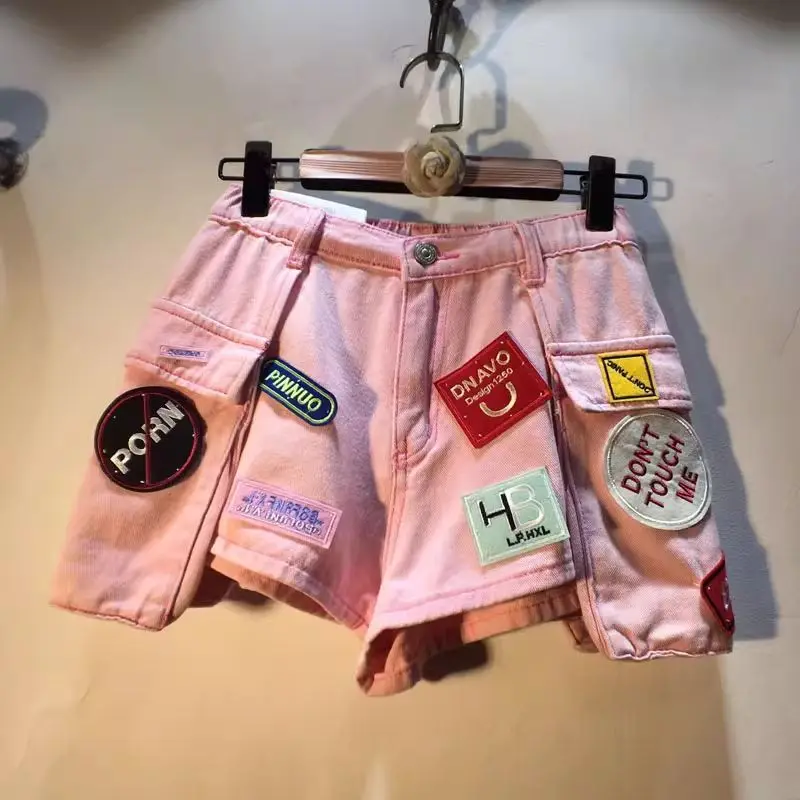 2026 Summer New Embroidery Letter Sticker High Waist Pocket Cargo Denim Shorts Women
2026 Summer New Embroidery Letter Sticker High Waist Pocket Cargo Denim Shorts Women