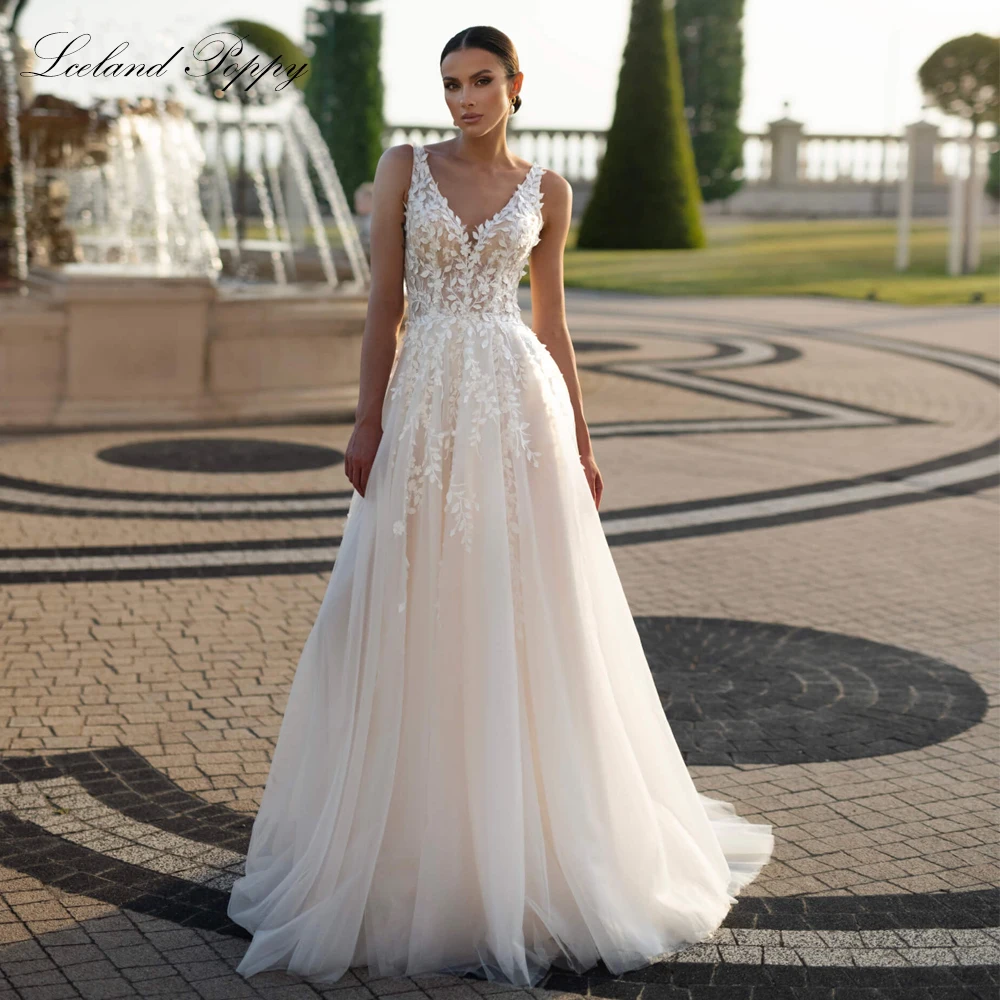 Lceland Poppy Customized A Line V Neck Wedding Dresses Illusion Backless Lace Bridal Gowns with Sweep Train
Lceland Poppy Customized A Line V Neck Wedding Dresses Illusion Backless Lace Bridal Gowns with Sweep Train
