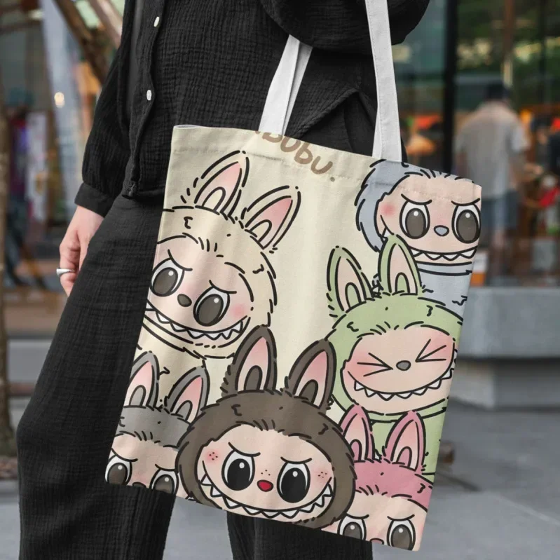 Cute Lisa Same Labubu Canvas Bag Female Cute Cartoon Shopping HandBag Casual Student Shoulder Bag The Monsters Crossbody Bags
Cute Lisa Same Labubu Canvas Bag Female Cute Cartoon Shopping HandBag Casual Student Shoulder Bag The Monsters Crossbody Bags
