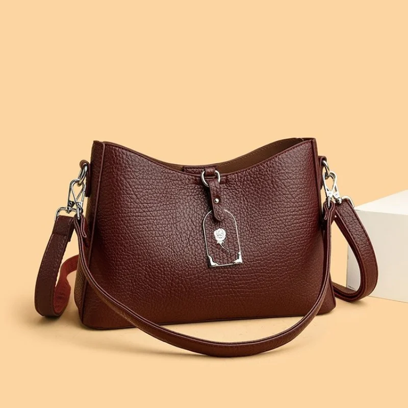 Роскошная брендовая женская сумка, кожаная сумка через плечо, большая сумка известного дизайнера, элегантная классика
Роскошная брендовая женская сумка, кожаная сумка через плечо, большая сумка известного дизайнера, элегантная классика