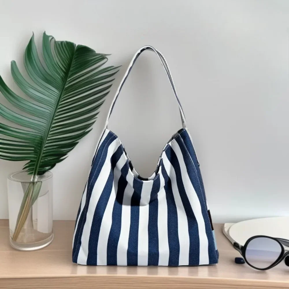 Cross-border factory original slack canvas accompanying bag women's large-capacity striped computer bag student commuter bag
Cross-border factory original slack canvas accompanying bag women's large-capacity striped computer bag student commuter bag