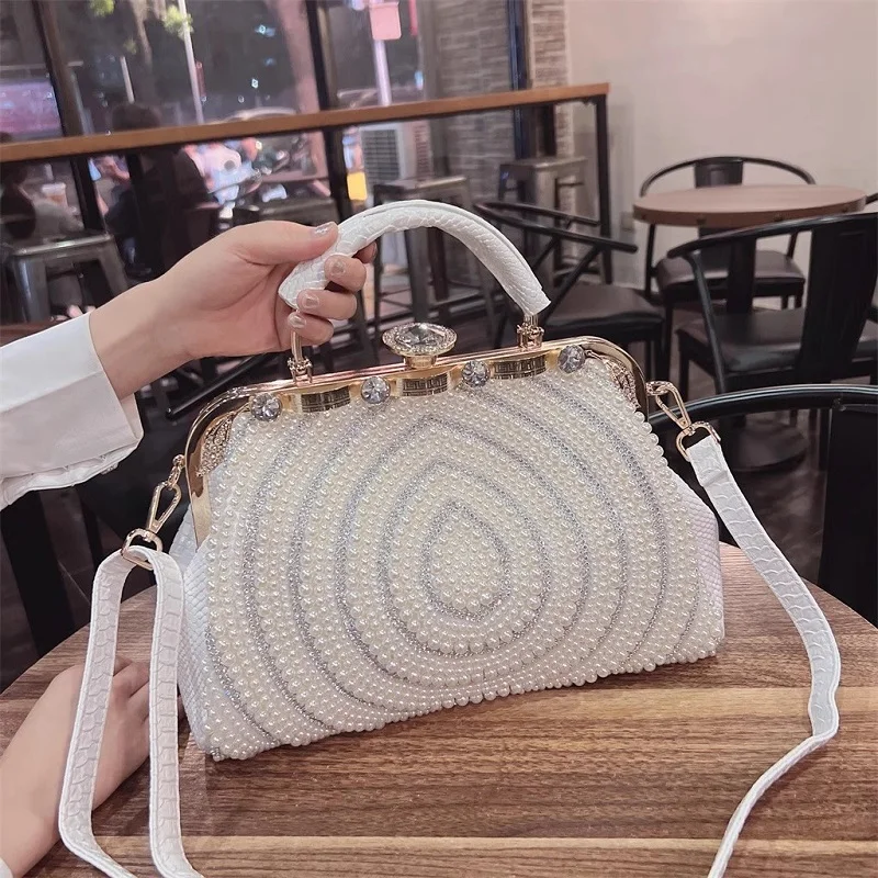Spring and Summer New Fashion Pearl Inlaid Diamond Handheld Clip Bag Versatile One Shoulder Crossbody Large Capacity Women's Bag
Spring and Summer New Fashion Pearl Inlaid Diamond Handheld Clip Bag Versatile One Shoulder Crossbody Large Capacity Women's Bag