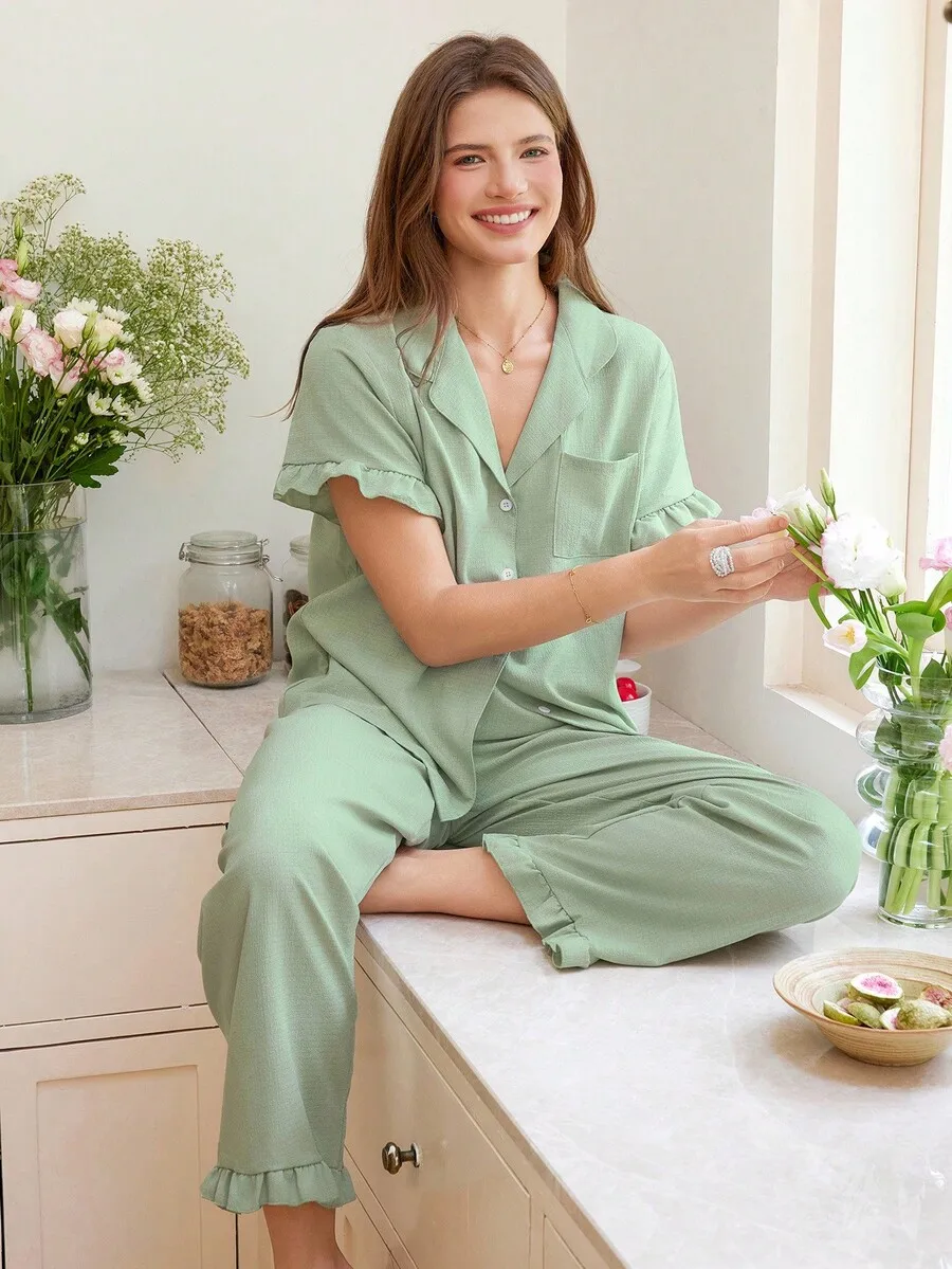 Mint Green Ruffle Trim Pajama Set With Front Pockets
Mint Green Ruffle Trim Pajama Set With Front Pockets