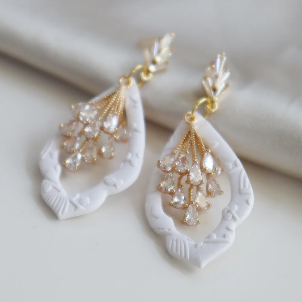 Geometry Hollow Dangle Earrings for Women Girls Wedding Bride Bridesmaid Drop Earring Polymer Clay Zircon Pendant Earrings Gift
Geometry Hollow Dangle Earrings for Women Girls Wedding Bride Bridesmaid Drop Earring Polymer Clay Zircon Pendant Earrings Gift