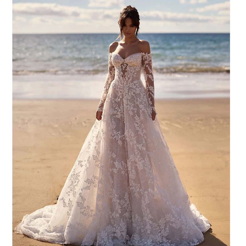 Graceful Wedding Dress Embroidered Lace On Net With Voluminous Flowers Ball Gown Boat Neck Full Sleeve Customized Bride Dress
Graceful Wedding Dress Embroidered Lace On Net With Voluminous Flowers Ball Gown Boat Neck Full Sleeve Customized Bride Dress