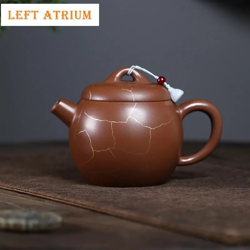 450ml Yixing Purple Clay Teapots Handmade Gold Drawing Large Caliber Pot Raw Ore Red Gold Zhu Mud Tea Making Kettle Zisha Teaset
450ml Yixing Purple Clay Teapots Handmade Gold Drawing Large Caliber Pot Raw Ore Red Gold Zhu Mud Tea Making Kettle Zisha Teaset