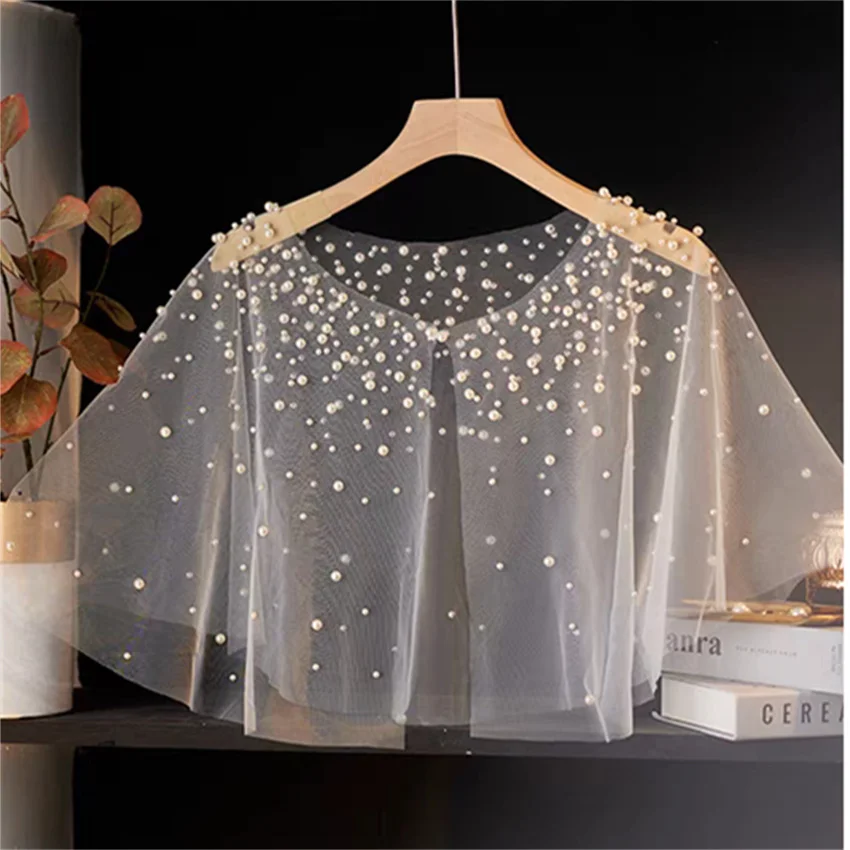2025 Elegant Women Beading Shawl Capes Lady Lace Wrap Bolero Accessories Coat Loose Hollow Out Cloak Party Tops Pullovers 2461
2025 Elegant Women Beading Shawl Capes Lady Lace Wrap Bolero Accessories Coat Loose Hollow Out Cloak Party Tops Pullovers 2461