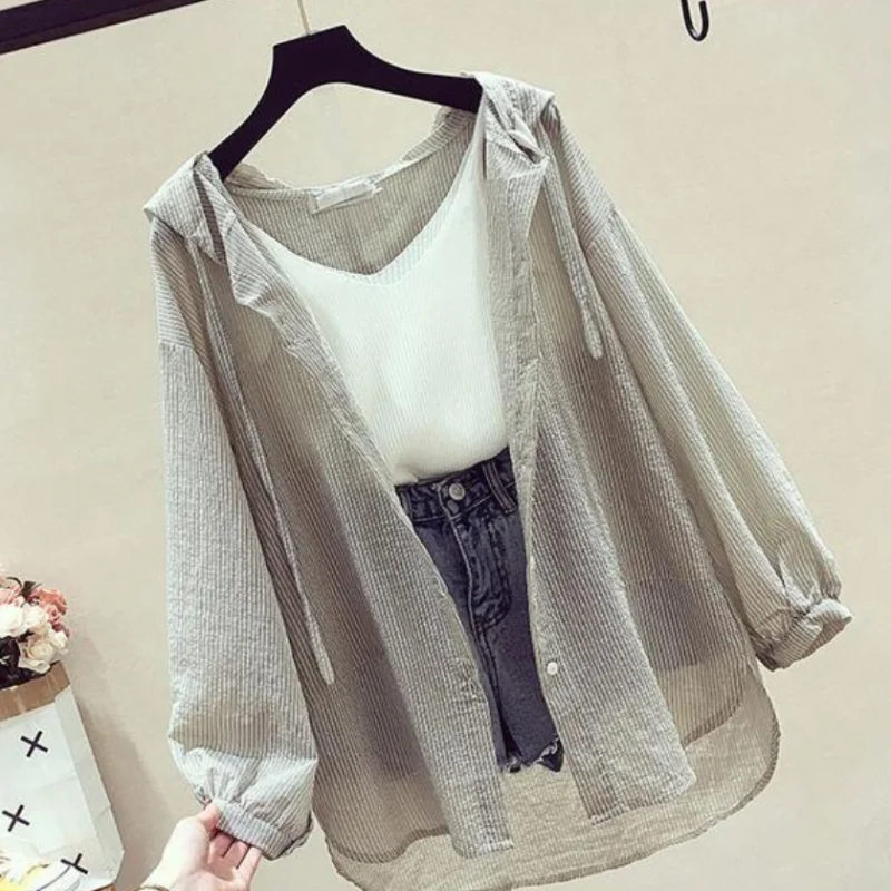 Sunscreen Clothing Women's Loose Mid-length Button Shirts Summer New Thin Breathable Long Sleeve Hooded Coat Outdoor Sports Tops
Sunscreen Clothing Women's Loose Mid-length Button Shirts Summer New Thin Breathable Long Sleeve Hooded Coat Outdoor Sports Tops