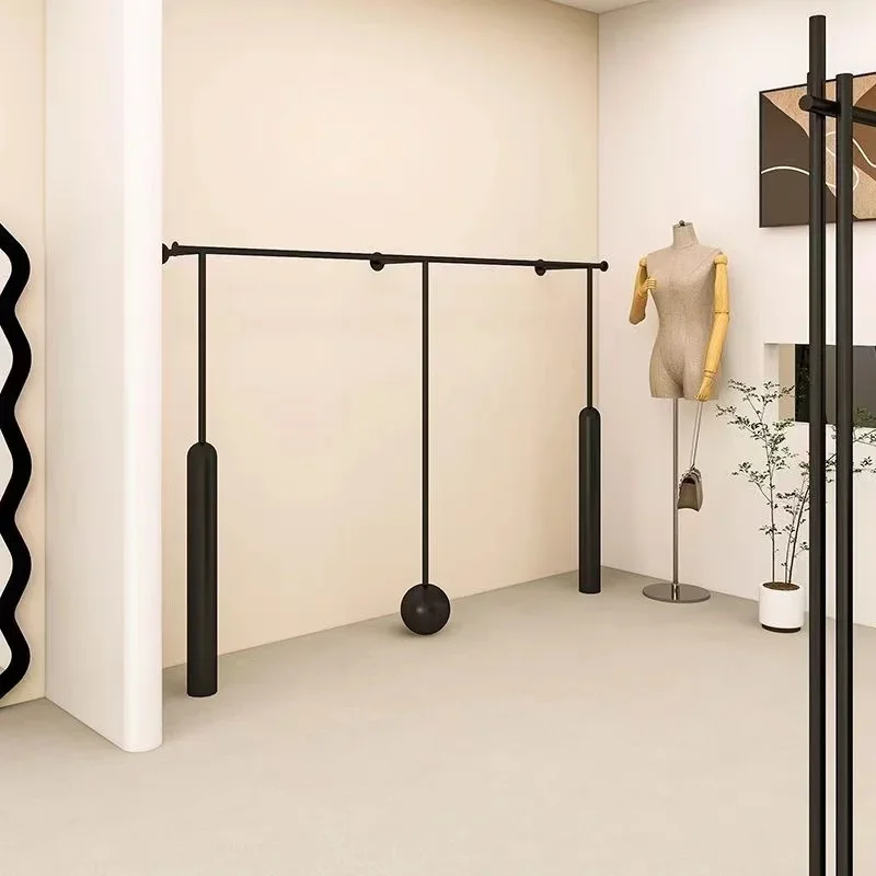New clothing store black shape wall-mounted display rack men's and women's clothing display rack
New clothing store black shape wall-mounted display rack men's and women's clothing display rack