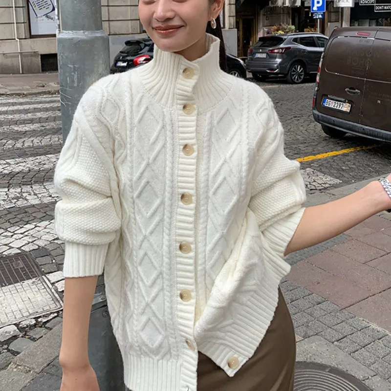 Retro High-neck Twisted Knit Cardigan for Women, 2025 Autumn and Winter New Thick Casual Loose Sweater Coat. 
Retro High-neck Twisted Knit Cardigan for Women, 2025 Autumn and Winter New Thick Casual Loose Sweater Coat.