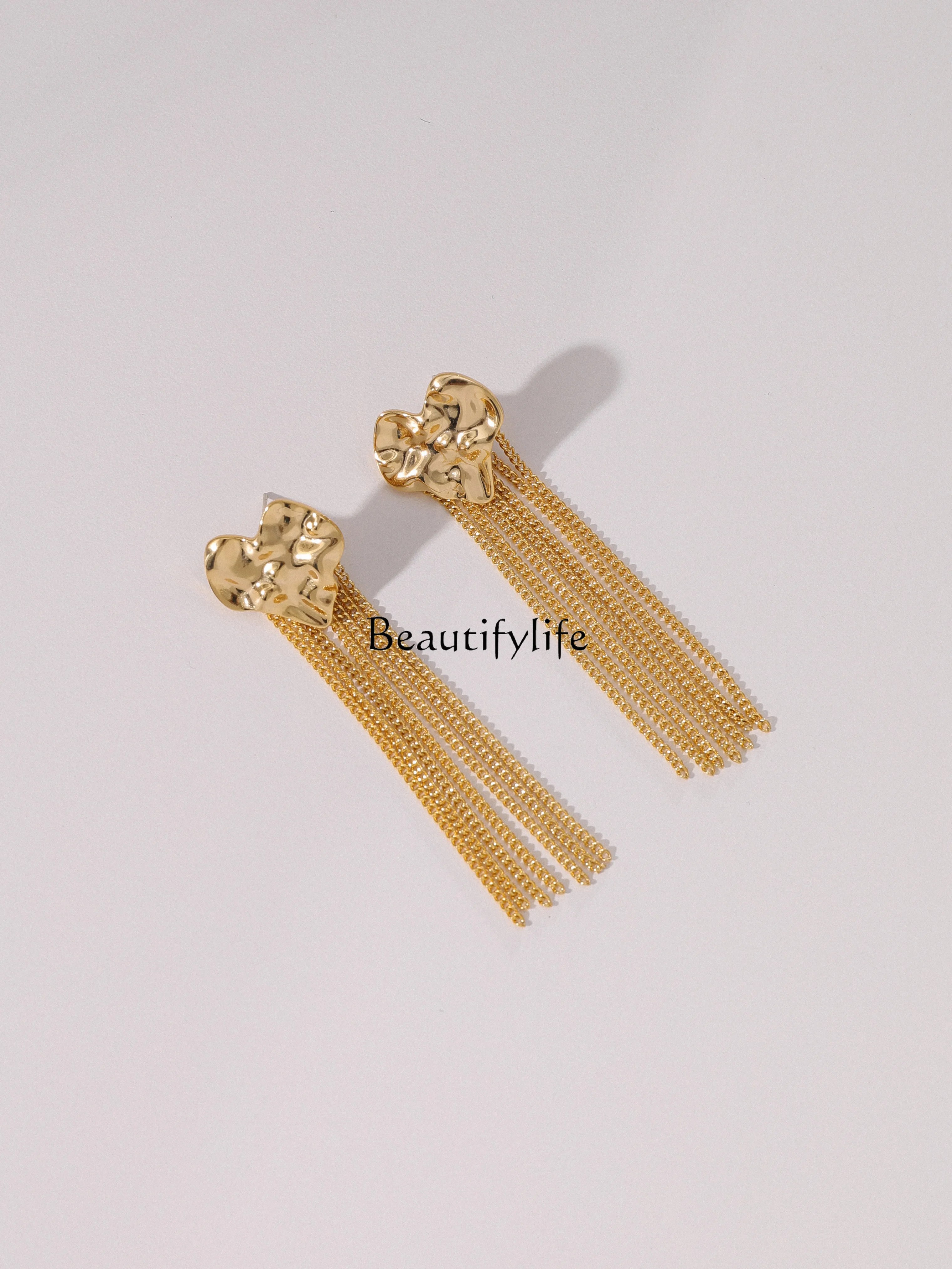 European and American metal love earrings retro temperament fringed versatile earrings
European and American metal love earrings retro temperament fringed versatile earrings
