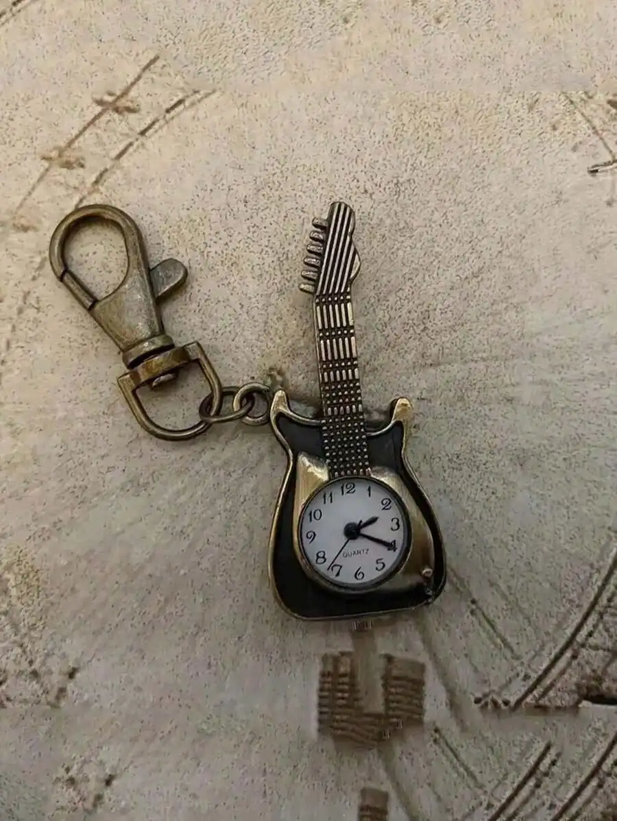 1PC Classic Vintage Guitar Pocket Watch Creative Bronze Keychain Novelty Quartz Watch Car Keychain Pendant Bag Accessories
1PC Classic Vintage Guitar Pocket Watch Creative Bronze Keychain Novelty Quartz Watch Car Keychain Pendant Bag Accessories