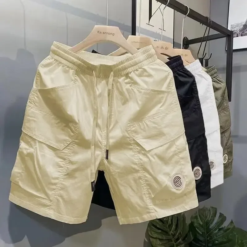 Лето 2025 г., повседневная свободная мужская рабочая одежда, шорты, модная брендовая верхняя одежда, брюки с пятью точками, универсальные удобные спортивные штаны в корейском стиле
Лето 2025 г., повседневная свободная мужская рабочая одежда, шорты, модная брендовая верхняя одежда, брюки с пятью точками, универсальные удобные спортивные штаны в корейском стиле
