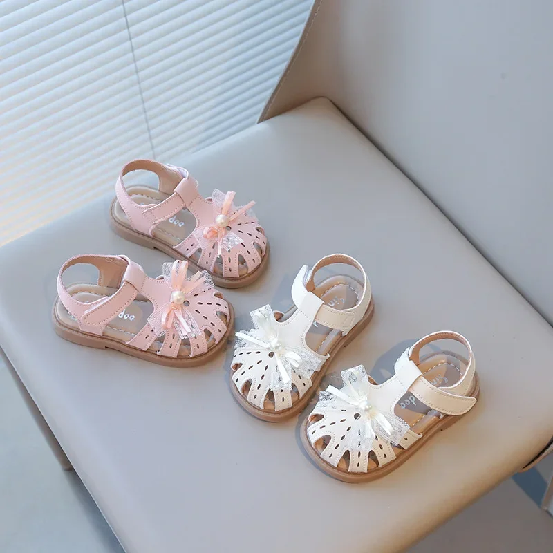 Детские сандалии принцессы с лентой и бантом, новые летние сандалии для маленьких девочек, детская обувь на мягкой подошве для малышей, размер 21-30
Детские сандалии принцессы с лентой и бантом, новые летние сандалии для маленьких девочек, детская обувь на мягкой подошве для малышей, размер 21-30