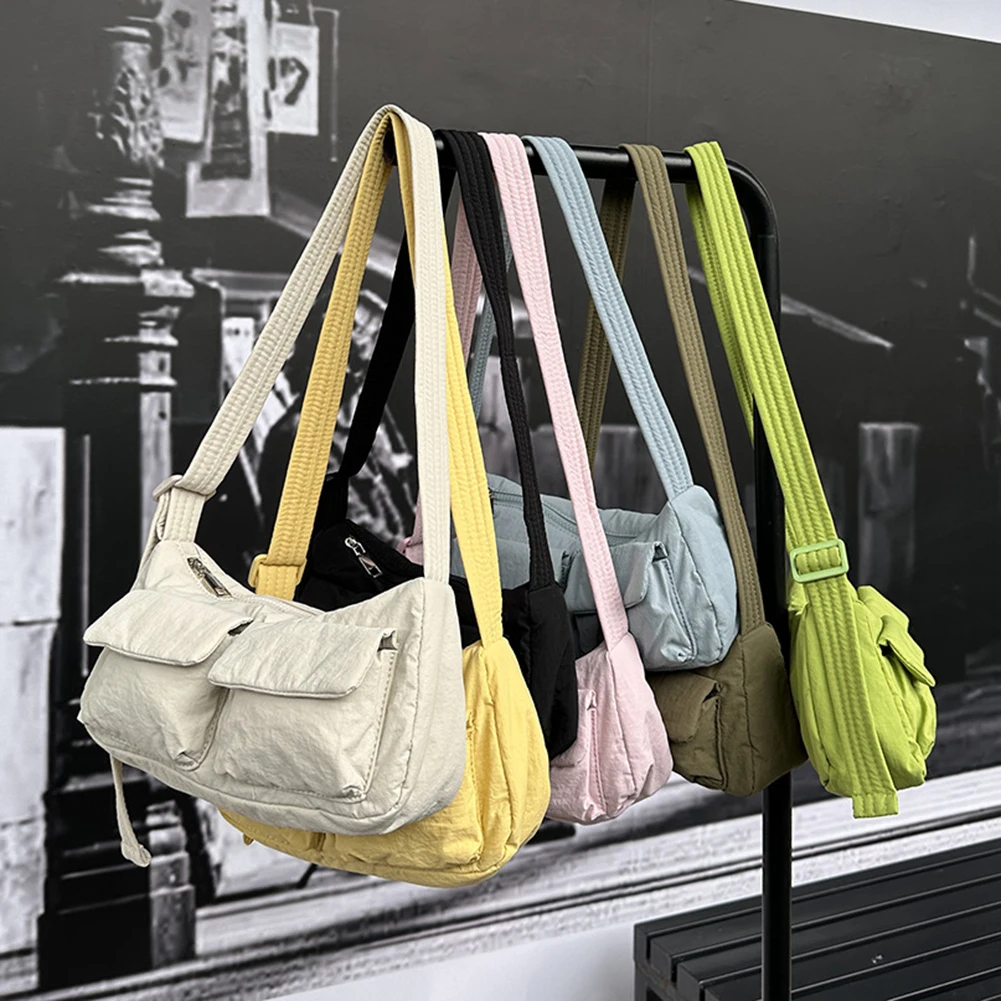 Модная однотонная женская сумка через плечо, простой мессенджер, нейлоновая вместительная сумочка через плечо с несколькими карманами для путешествий и отдыха на открытом воздухе
Модная однотонная женская сумка через плечо, простой мессенджер, нейлоновая вместительная сумочка через плечо с несколькими карманами для путешествий и отдыха на открытом воздухе