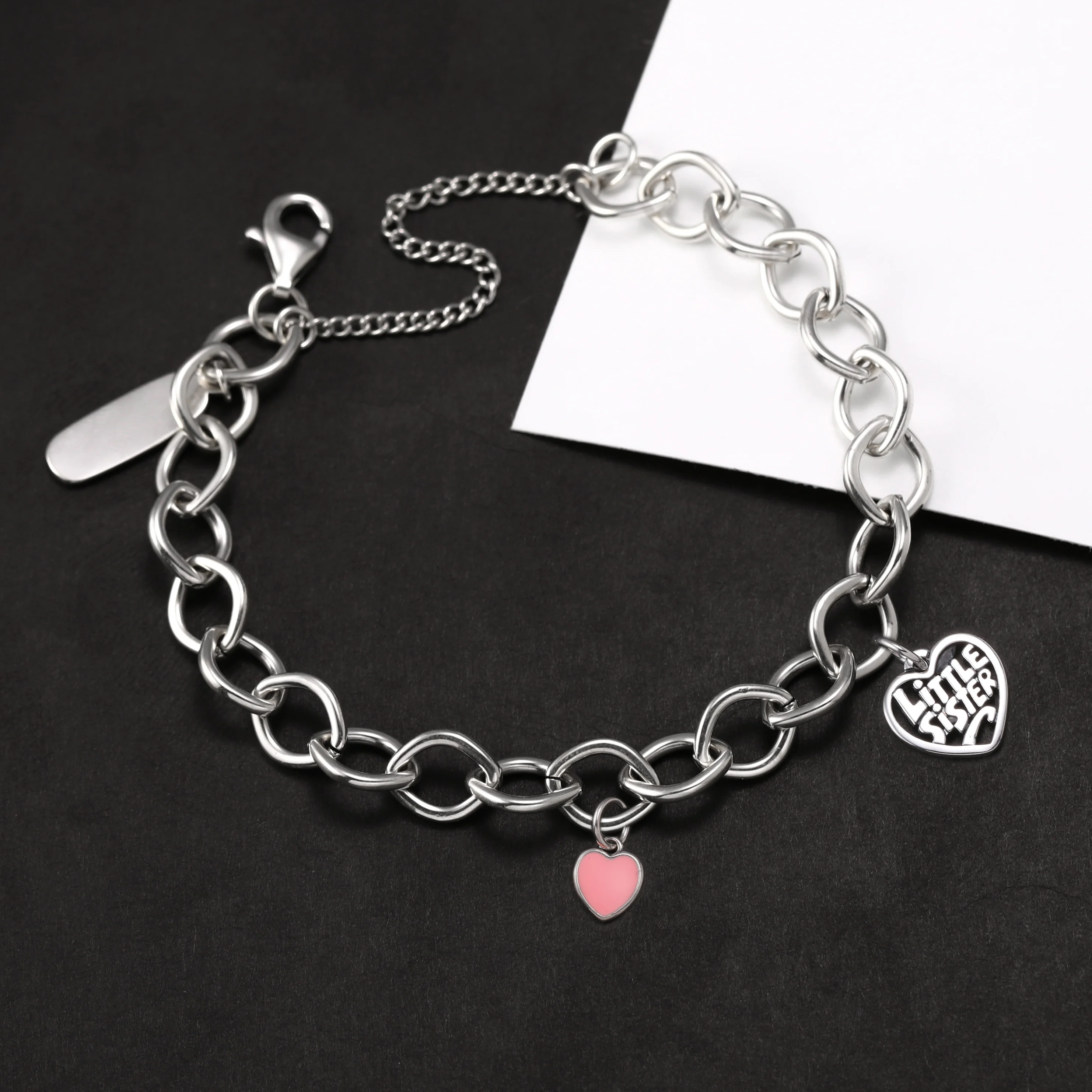Genuine 925 sterling silver Forged Link Charm Bracelet paired with enamel connected heart and "Little sister's" heart pendant
Genuine 925 sterling silver Forged Link Charm Bracelet paired with enamel connected heart and "Little sister's" heart pendant