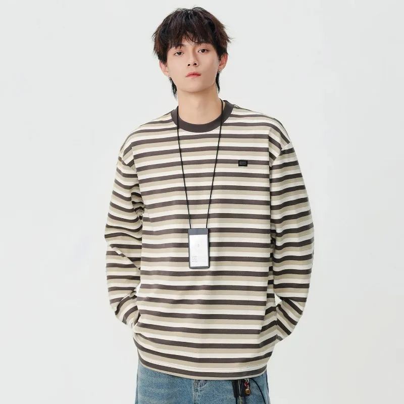 Свободная футболка с круглым вырезом и длинными рукавами в полоску, повседневная базовая многослойная рубашка в корейском стиле, хлопковая, молодежная, летняя, тонкая модель
Свободная футболка с круглым вырезом и длинными рукавами в полоску, повседневная базовая многослойная рубашка в корейском стиле, хлопковая, молодежная, летняя, тонкая модель