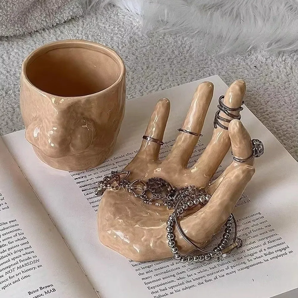 Креативный многофункциональный поднос для ювелирных изделий ручной работы, керамический держатель для кистей в форме носа, держатель для ручек, чашка, украшение для дома
Креативный многофункциональный поднос для ювелирных изделий ручной работы, керамический держатель для кистей в форме носа, держатель для ручек, чашка, украшение для дома