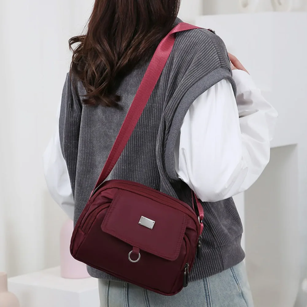 Zipper Middle-aged Mother's Bag Large Capacity Casual Mobile Phone Shoulder Bag Multi-pocket Solid Color
Zipper Middle-aged Mother's Bag Large Capacity Casual Mobile Phone Shoulder Bag Multi-pocket Solid Color