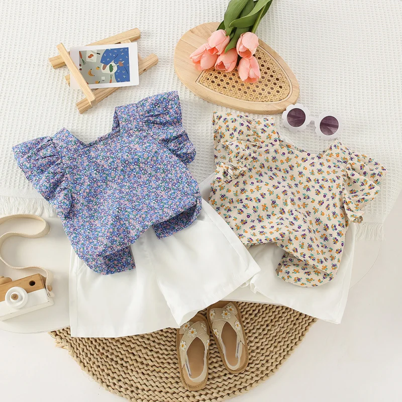 2025Summer Fashion Girls Small Floral Flounced Sleeve Top+White Shorts Two-Piece Suit 
2025Summer Fashion Girls Small Floral Flounced Sleeve Top+White Shorts Two-Piece Suit