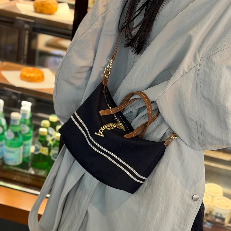 Denim & Genuine Cowhide Leather Mini Dome Bag for Women Luxury Designer Top Handle Crossbody Shoulder Bag with Gold Chain Detail
Denim & Genuine Cowhide Leather Mini Dome Bag for Women Luxury Designer Top Handle Crossbody Shoulder Bag with Gold Chain Detail
