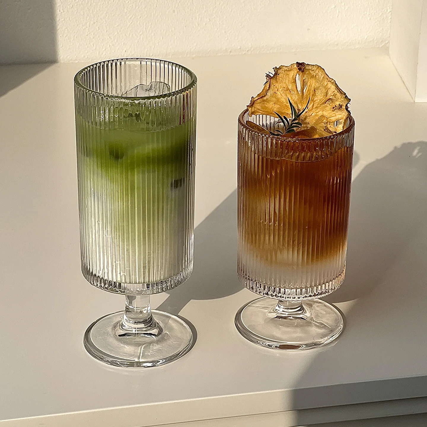 Vertical Stripe Glass Juice Cup High Foot Ice Cream Coffee Beverage Round Cup Transparent Drinkware Home Kitchen Supplies
Vertical Stripe Glass Juice Cup High Foot Ice Cream Coffee Beverage Round Cup Transparent Drinkware Home Kitchen Supplies