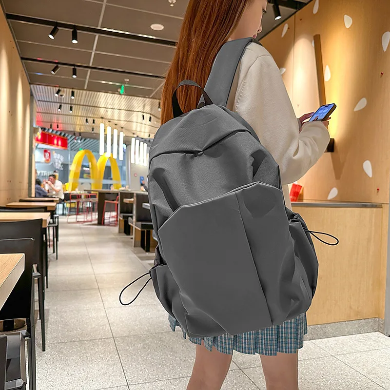 College student schoolbag backpack women's large-capacity out storage computer bag men's fashion trend
College student schoolbag backpack women's large-capacity out storage computer bag men's fashion trend