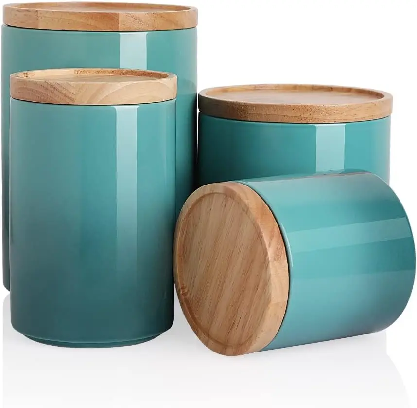 Набор керамических банок для хранения продуктов с деревянными крышками, герметичные контейнеры для кофе, чая, трав - набор из 4 штук в градиентном синем цвете
Набор керамических банок для хранения продуктов с деревянными крышками, герметичные контейнеры для кофе, чая, трав - набор из 4 штук в градиентном синем цвете