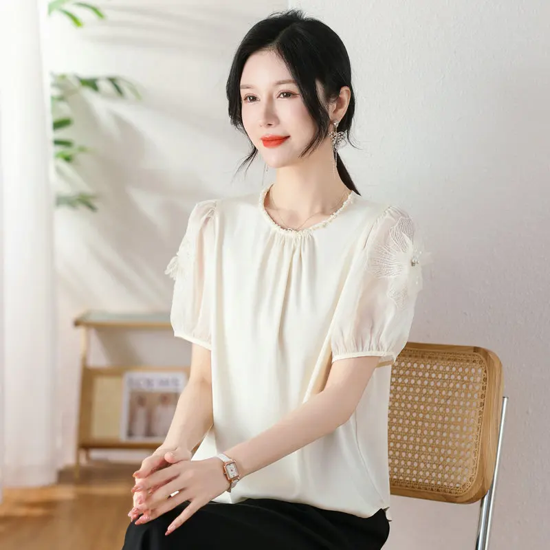 Summer Women Beige Chiffon Blouses Round Collar With Wrinkle Design & Lace Flower Short Sleeve Decor Tops Ladies Elegant Clothes
Summer Women Beige Chiffon Blouses Round Collar With Wrinkle Design & Lace Flower Short Sleeve Decor Tops Ladies Elegant Clothes