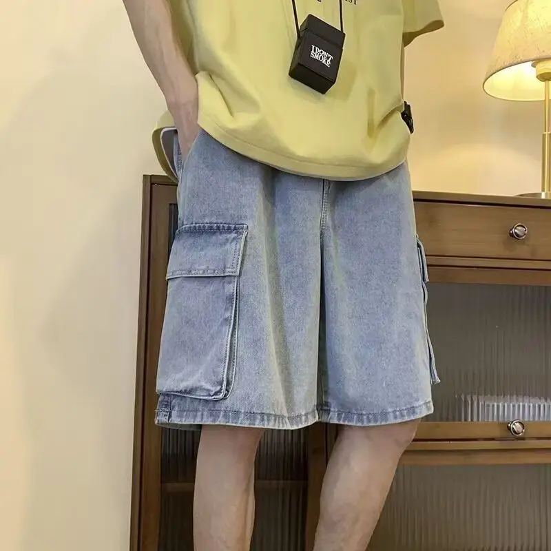 Mens Drawstring Waist Big Cargo Pocket Loose Wide Leg Denim Knee Length Shorts
Mens Drawstring Waist Big Cargo Pocket Loose Wide Leg Denim Knee Length Shorts