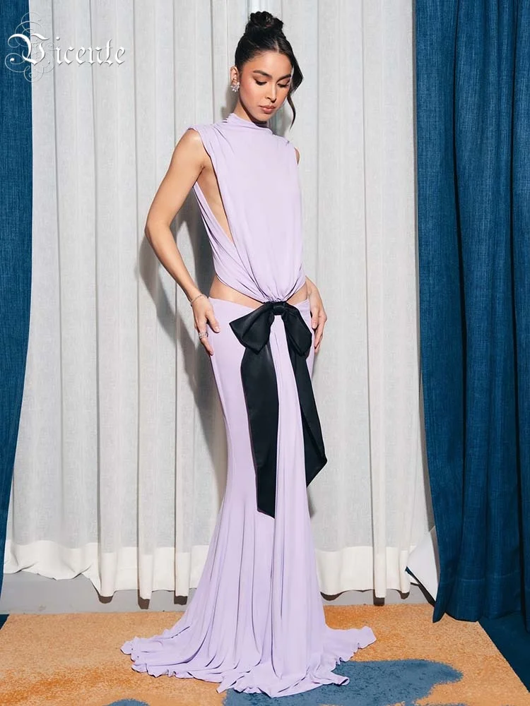 VC Chic Asymmetric Lilac Dress Gown with Cut-Out Detail and Black Bow for a Fashion-Forward Event
VC Chic Asymmetric Lilac Dress Gown with Cut-Out Detail and Black Bow for a Fashion-Forward Event