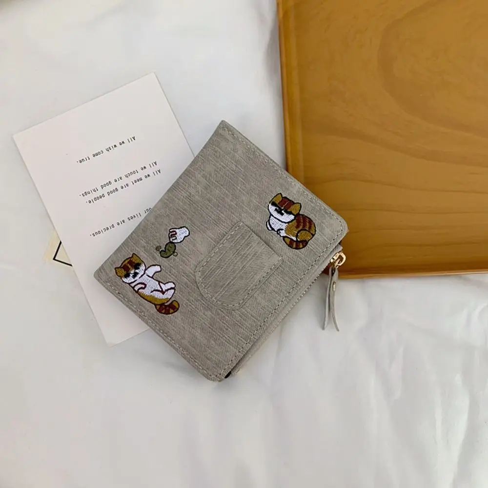 Korean Style Embroidered Cat Wallet Purse Short Clutch Canvas Card Bag Multi-function Multi Slot Coin Pouch Card Storage Bag
Korean Style Embroidered Cat Wallet Purse Short Clutch Canvas Card Bag Multi-function Multi Slot Coin Pouch Card Storage Bag