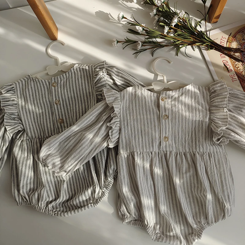 Spring Baby Striped Romper Newborn Clothes Korean Cute Ruffled Bib Collar Toddler Girl Sweet Triangle Romper Mamelucos Kleding
Spring Baby Striped Romper Newborn Clothes Korean Cute Ruffled Bib Collar Toddler Girl Sweet Triangle Romper Mamelucos Kleding