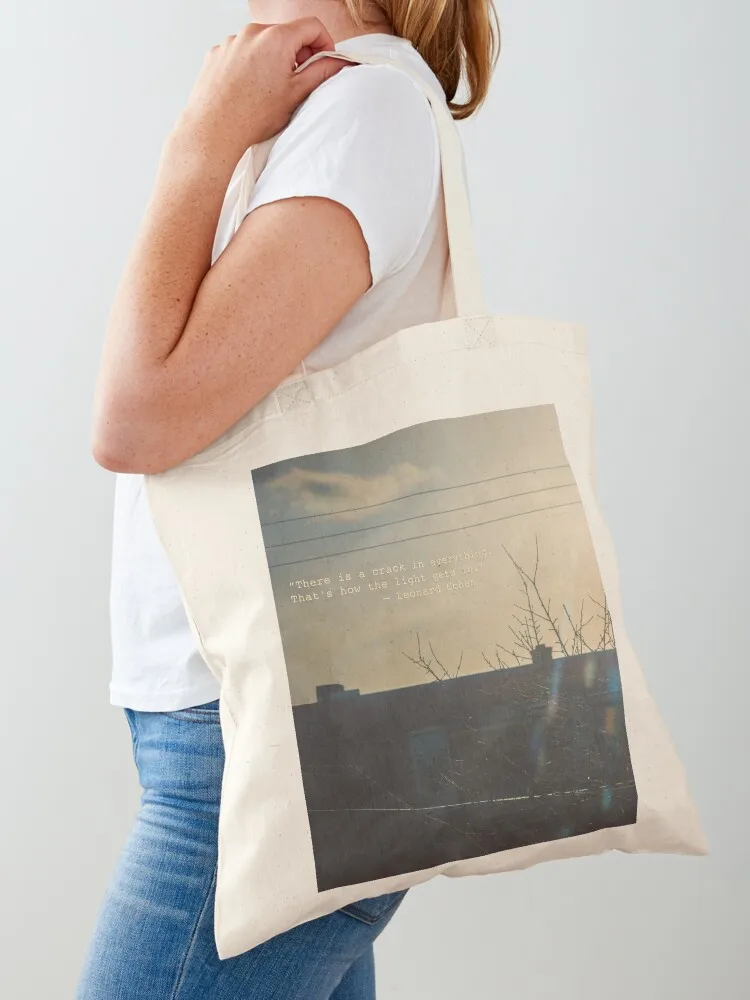 “There is a crack in everything. That's how the light gets in.” ~ Leonard Cohen Tote Bag women bag
“There is a crack in everything. That's how the light gets in.” ~ Leonard Cohen Tote Bag women bag