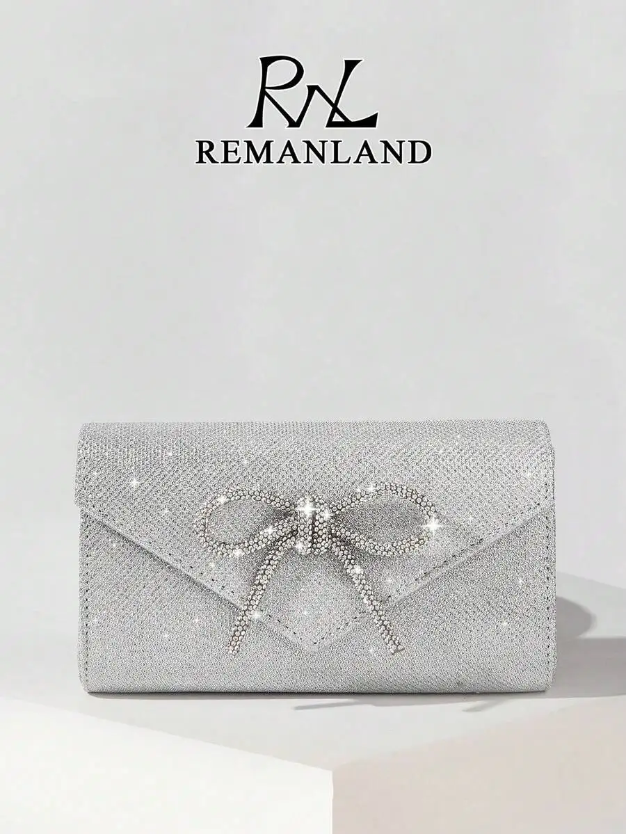 Light Luxury Glamorous Silver Envelope Clutch, glitter finish with crystal bow embellishment for party soiree women gift.
Light Luxury Glamorous Silver Envelope Clutch, glitter finish with crystal bow embellishment for party soiree women gift.