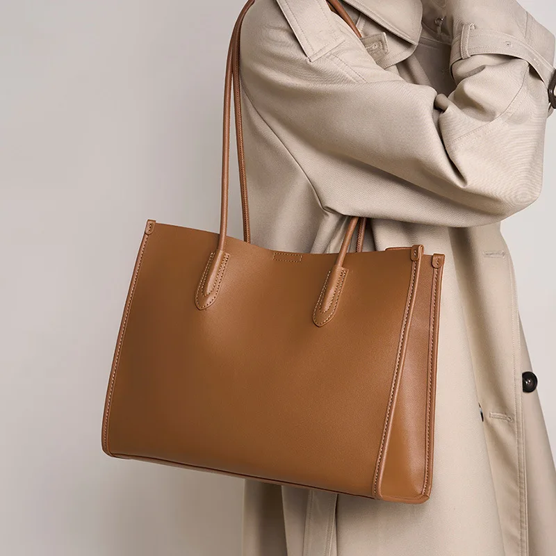 New large capacity cowhide shoulder bag, leather women's bag, niche soft leather tote bag
New large capacity cowhide shoulder bag, leather women's bag, niche soft leather tote bag