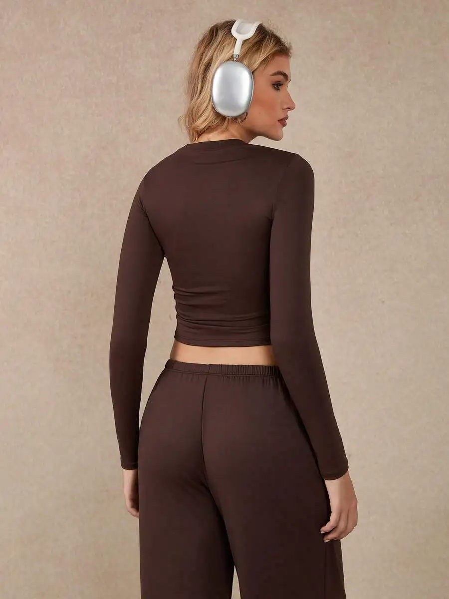 Women Solid Color Round Neck Long Sleeve Cropped Top And Wide Leg Pants Set For Fitness Workout
Women Solid Color Round Neck Long Sleeve Cropped Top And Wide Leg Pants Set For Fitness Workout
