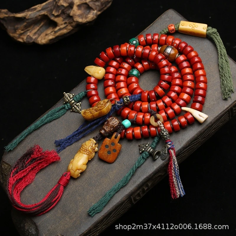 Vintage , single-loop yak bone , glass agate, and dzi bead accessory bracelet
Vintage , single-loop yak bone , glass agate, and dzi bead accessory bracelet