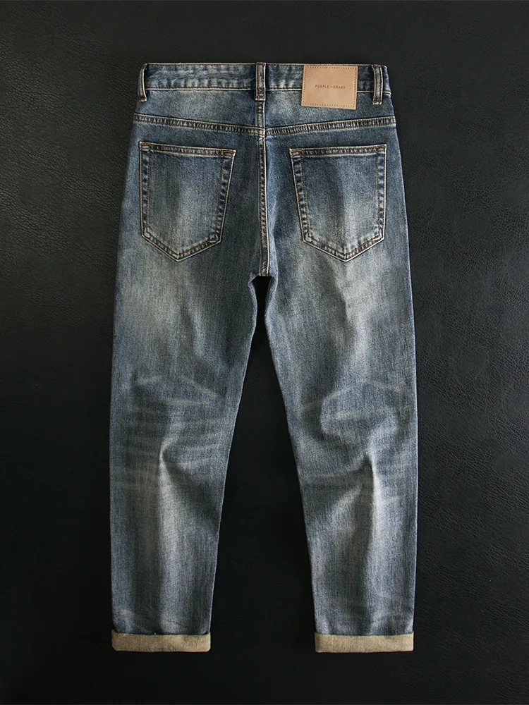 Мужские джинсы со сломанными дырками, осенняя мода, маленькая прямая трубка, эластичные, классные и модные брюки высокого класса. 
Мужские джинсы со сломанными дырками, осенняя мода, маленькая прямая трубка, эластичные, классные и модные брюки высокого класса.