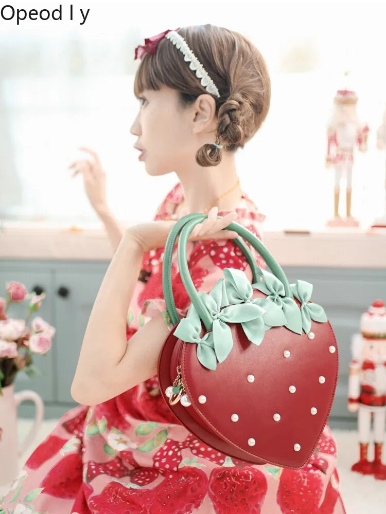 Sweetheart Girl Japanese Original Lolita Pearl Strawberry Handbag Cute Bow Large Capacity Versatile Zipper Messenger Bag
Sweetheart Girl Japanese Original Lolita Pearl Strawberry Handbag Cute Bow Large Capacity Versatile Zipper Messenger Bag
